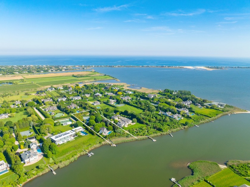 Set on over 2 acres, this waterfront property boasts 147 feet of - Beach Home for sale in Water Mill, New York on Beachhouse.com