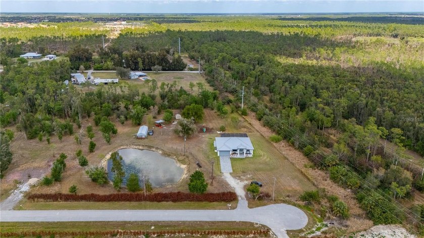 Tucked back for added privacy and quiet! This 5.58-acre retreat - Beach Home for sale in North Fort Myers, Florida on Beachhouse.com