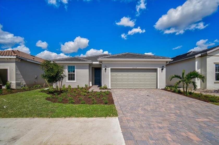 BRAND NEW HOME, NEVER OCCUPIED! LOADED WITH UPGRADES AND - Beach Home for sale in Englewood, Florida on Beachhouse.com
