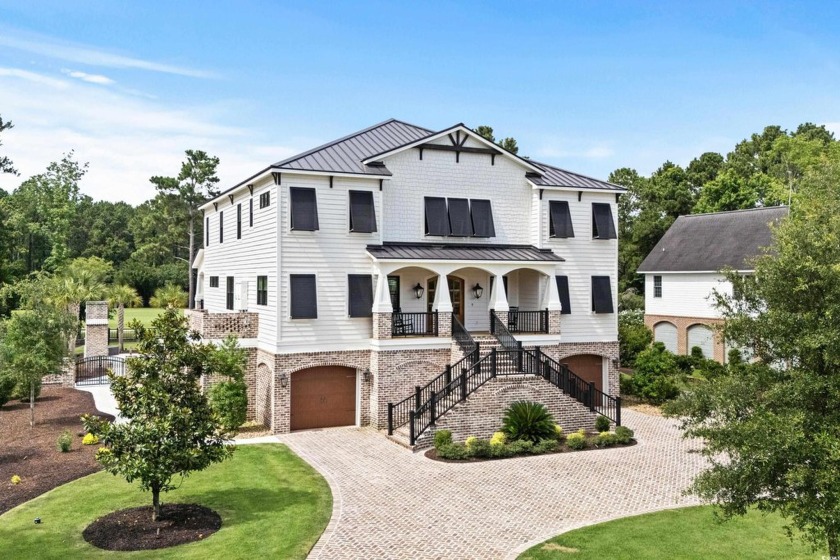 Welcome to 1025 Collins Meadow Dr., a magnificent home that - Beach Home for sale in Georgetown, South Carolina on Beachhouse.com