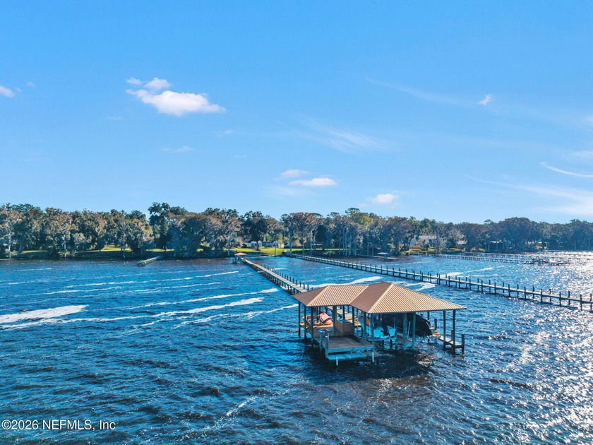A distinguished riverfront home privately set beyond a majestic - Beach Home for sale in Saint Johns, Florida on Beachhouse.com