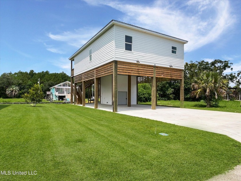 Welcome to beautiful Bay St. Louis! This stunning waterfront - Beach Home for sale in Bay Saint Louis, Mississippi on Beachhouse.com