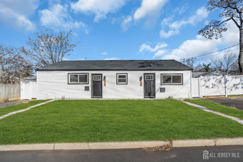 This sleek and stylish side-by-side 2-family duplex is located - Beach Lot for sale in Keyport, New Jersey on Beachhouse.com