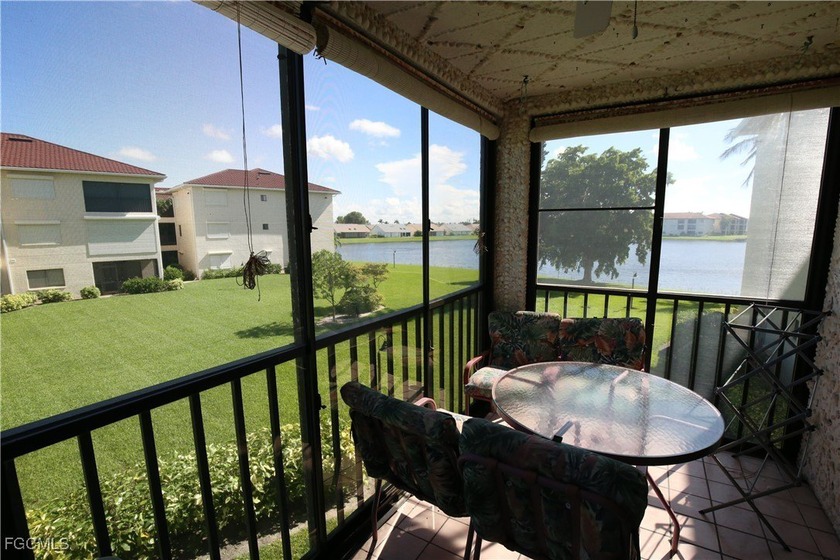 Move-in ready second-floor condo with wonderful lake views! This - Beach Condo for sale in Fort Myers, Florida on Beachhouse.com