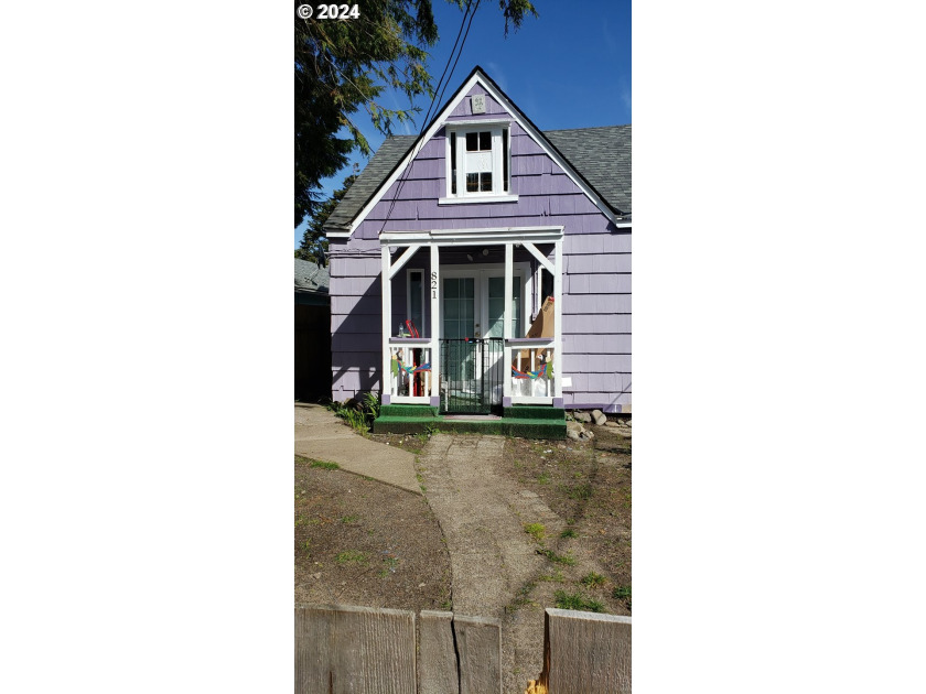 Step into coastal paradise with this remarkable double cottage - Beach Lot for sale in Seaside, Oregon on Beachhouse.com