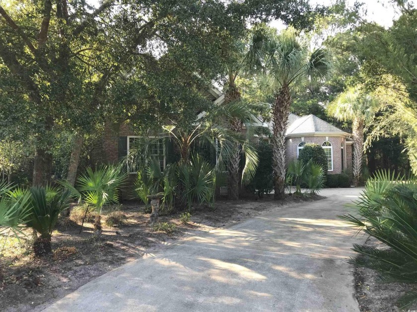 This all brick, custom home is situate on one of the largest - Beach Home for sale in Pawleys Island, South Carolina on Beachhouse.com