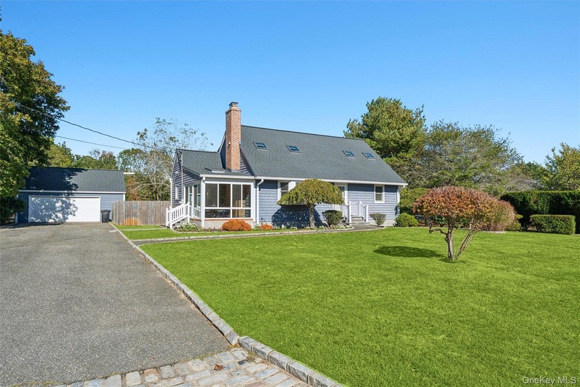 Welcome to this beautifully maintained 4-bedroom, 2-bath home - Beach Home for sale in Center Moriches, New York on Beachhouse.com
