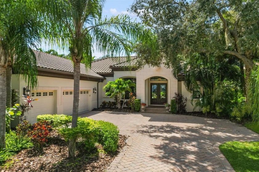 Welcome to 7234 Greystone St, a custom designed pool home on an - Beach Home for sale in Lakewood Ranch, Florida on Beachhouse.com