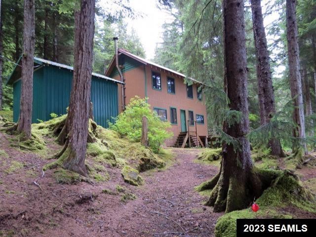 Two-story 2 BR/1 BA home with a guest cabin, wood shed and - Beach Home for sale in Tenakee Springs, Alaska on Beachhouse.com