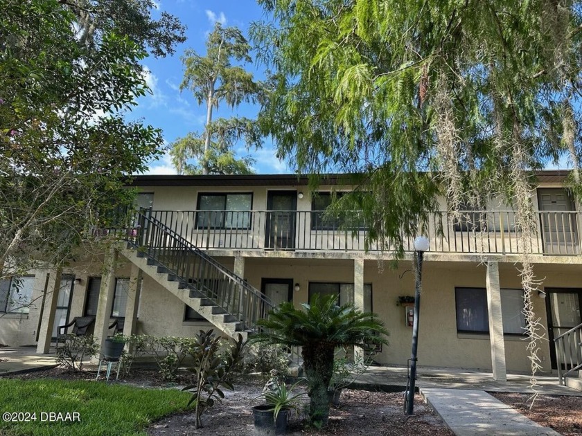 Lovely remodeled 2 bedroom, 1-1/2 bath unit on 2nd floor - Beach Condo for sale in South Daytona, Florida on Beachhouse.com