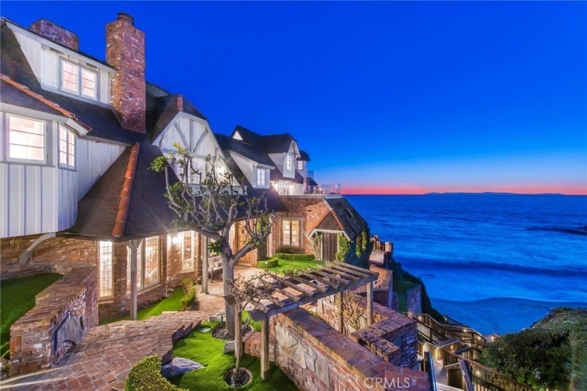 Resting high on a direct oceanfront corner bluff overlooking all - Beach Home for sale in Laguna Beach, California on Beachhouse.com