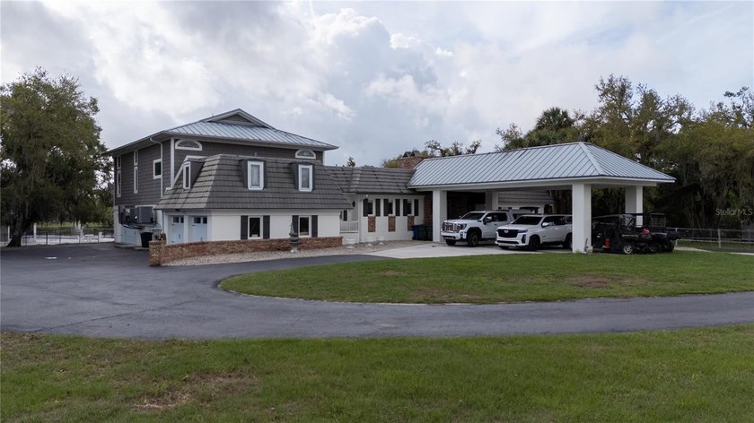 Nestled behind stately wrought-iron gates, this 38-acre private - Beach Home for sale in Sarasota, Florida on Beachhouse.com
