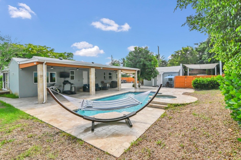 Fully upgraded home with guest house & pool in the non-HOA - Beach Home for sale in West Palm Beach, Florida on Beachhouse.com