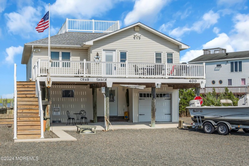 This beautifully renovated raised ranch offers unparalleled - Beach Home for sale in West Creek, New Jersey on Beachhouse.com