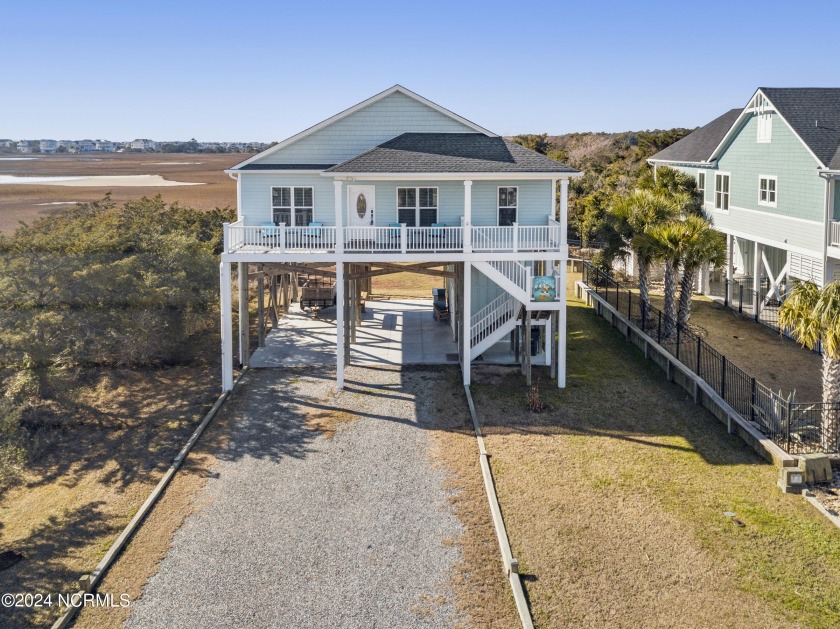 Surround yourself with breathtaking vistas of sunrises & sunsets - Beach Home for sale in Holden Beach, North Carolina on Beachhouse.com