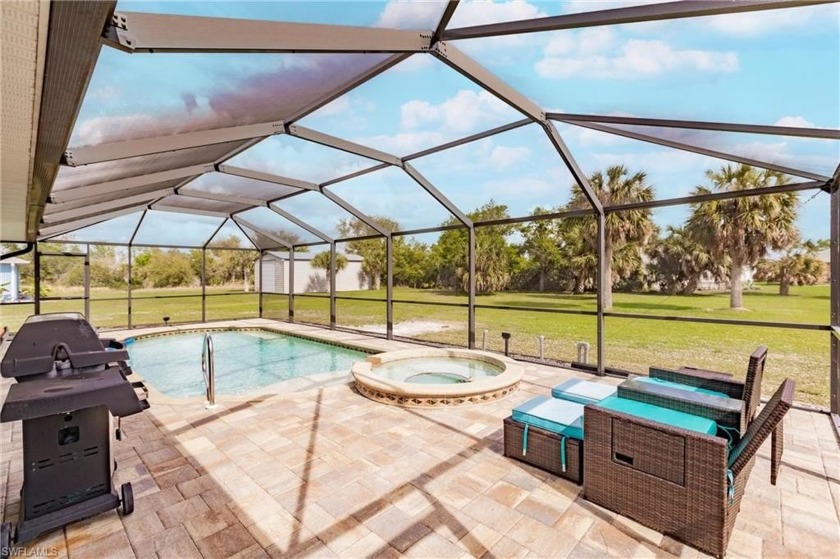 Beautiful Saltwater Pool Home on an Oversized Lot with a 3 Car - Beach Home for sale in Port Charlotte, Florida on Beachhouse.com