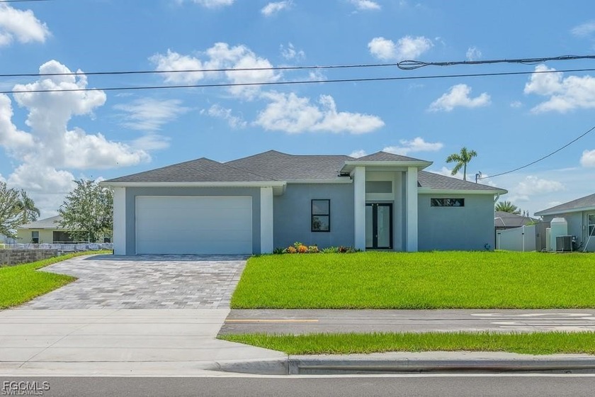 Secure this stunning new construction home while it's still in - Beach Home for sale in Cape Coral, Florida on Beachhouse.com