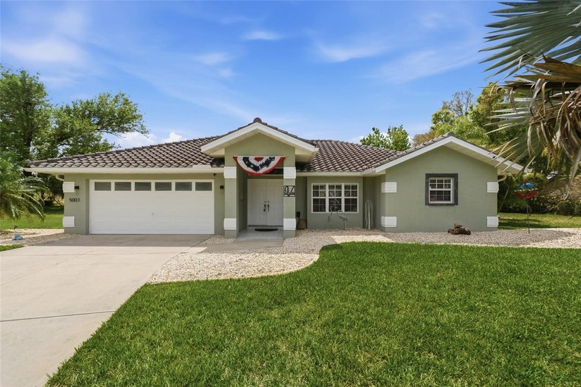 Stunning 3-Bedroom, 2 Bath pool home situated on a spacious - Beach Home for sale in North Port, Florida on Beachhouse.com