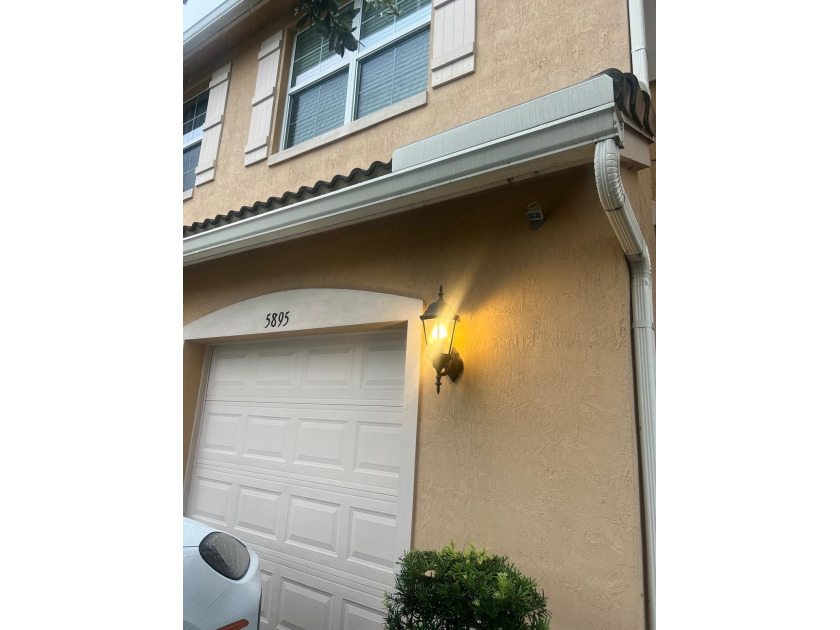 Experience true South Florida living in this jaw-dropping - Beach Townhome/Townhouse for sale in Lake Worth, Florida on Beachhouse.com