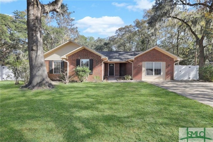 Located at 10 Colonial Drive in Midway, GA, this 4-bedroom - Beach Home for sale in Midway, Georgia on Beachhouse.com