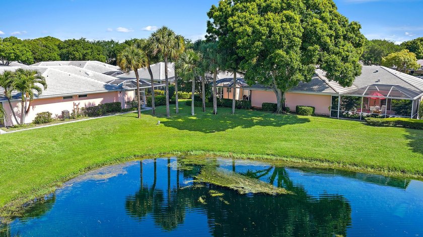 Single-level CBS villa with lakefront views and exceptional - Beach Home for sale in Palm Beach Gardens, Florida on Beachhouse.com