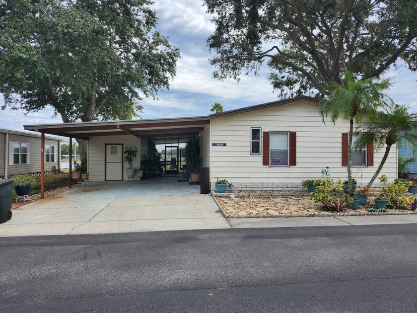 WATERFRONT/55+/88/2BD2BA/1248SQ/WATERFRONT LANAI/FOUNTAIN - Beach Home for sale in Riverview, Florida on Beachhouse.com