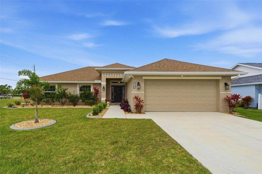 Beautifully maintained 4-bedroom, 2-bath pool home situated on a - Beach Home for sale in Punta Gorda, Florida on Beachhouse.com
