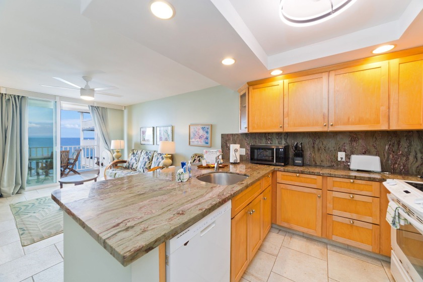 Experience true oceanfront living in this beautifully updated - Beach Condo for sale in Kailua Kona, Hawaii on Beachhouse.com