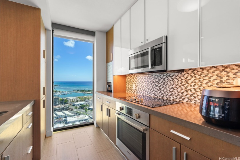 Experience modern island living in this high-floor corner end - Beach Condo for sale in Honolulu, Hawaii on Beachhouse.com