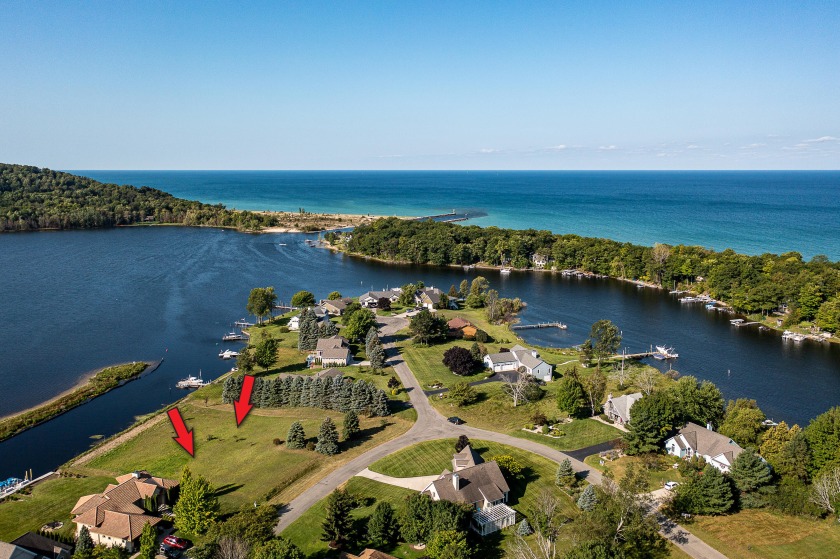100 feet of EXCEPTIONAL LAKE FRONTAGE improved and protected - Beach Lot for sale in Arcadia, Michigan on Beachhouse.com