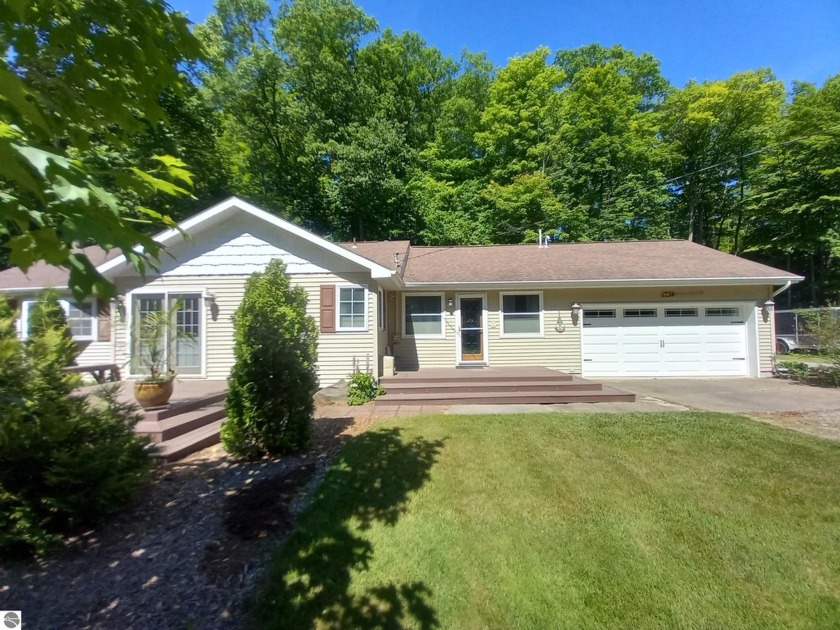 Beautiful ranch with 2 decks on front and one in back. 3 - Beach Home for sale in Tawas City, Michigan on Beachhouse.com