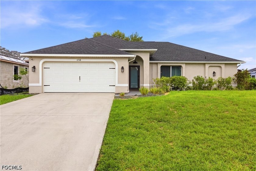 Welcome to this beautifully updated 3-bedroom, 2-bath WATERFRONT - Beach Home for sale in Cape Coral, Florida on Beachhouse.com