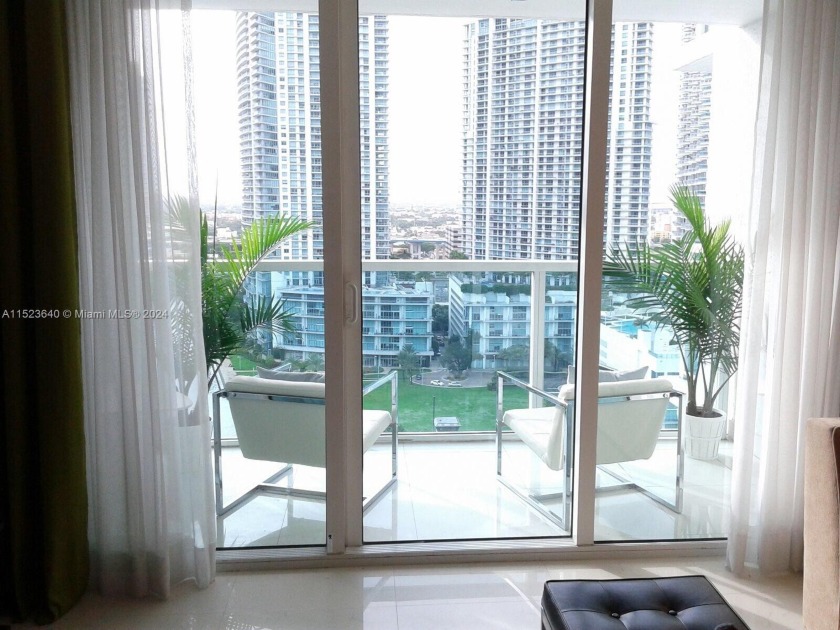 BEAUTIFUL 1/1 UNIT WITH VIEWS OF THE CITY AND RIVER. MARBLE - Beach Condo for sale in Miami, Florida on Beachhouse.com