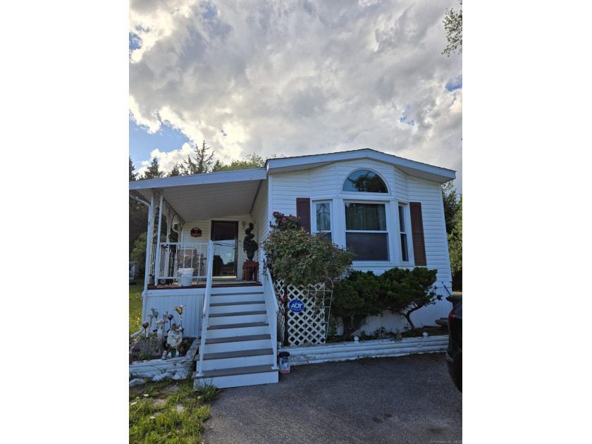 This cozy and immaculately maintained mobile home nestled on a - Beach Home for sale in Stonington, Connecticut on Beachhouse.com