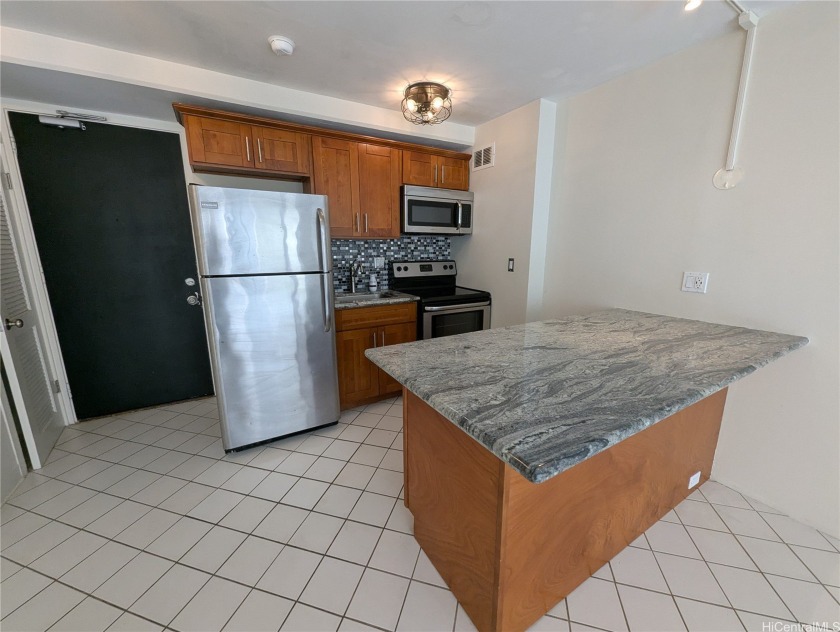 Experience the convenience of Waikiki living in this - Beach Condo for sale in Honolulu, Hawaii on Beachhouse.com
