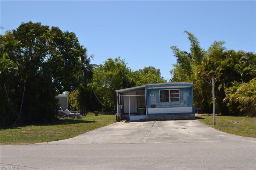 Lakefront mobile home on an oversized lot, needs some repair - Beach Home for sale in Naples, Florida on Beachhouse.com