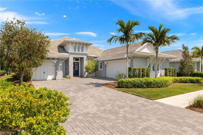 Experience the best of The Isles of Collier living in this - Beach Home for sale in Naples, Florida on Beachhouse.com