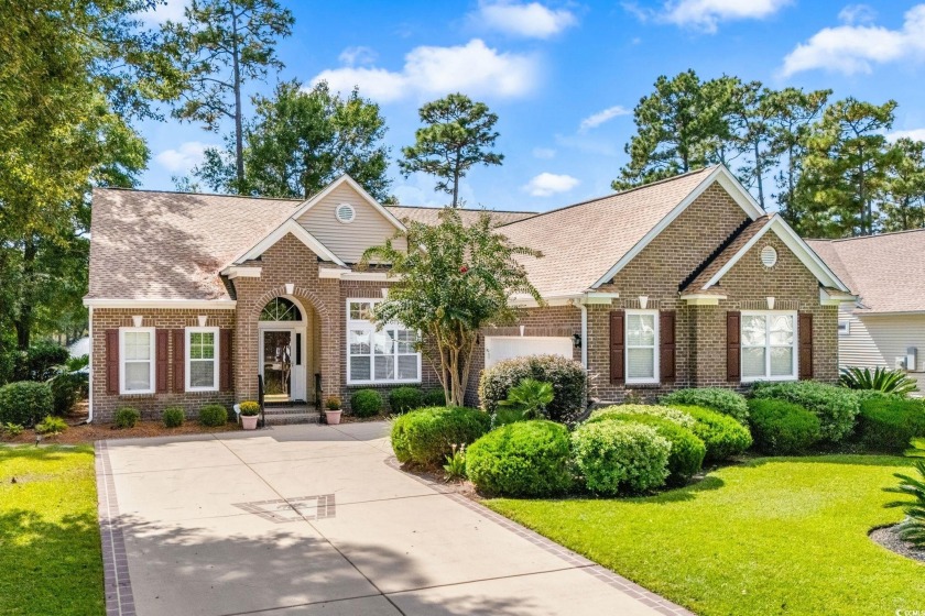 Welcome to this beautifully maintained custom-built 4-bedroom, 3 - Beach Home for sale in Pawleys Island, South Carolina on Beachhouse.com