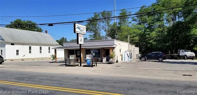 Elk and Torch Lake Market & Gas~ Waters Edge Market, situated on - Beach Commercial for sale in Kewadin, Michigan on Beachhouse.com