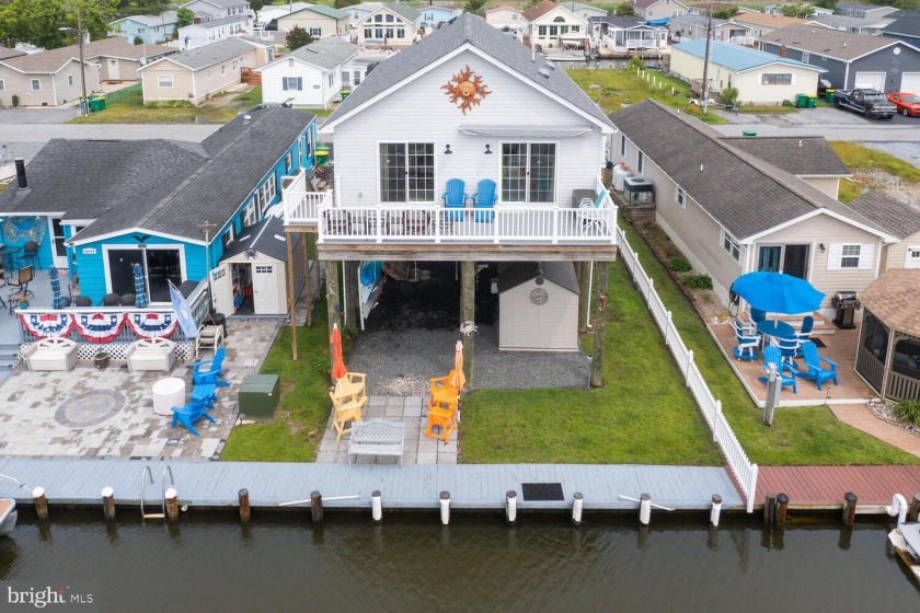 Rare opportunity to own in Swann Keys! Sit on your back deck and - Beach Home for sale in Selbyville, Delaware on Beachhouse.com