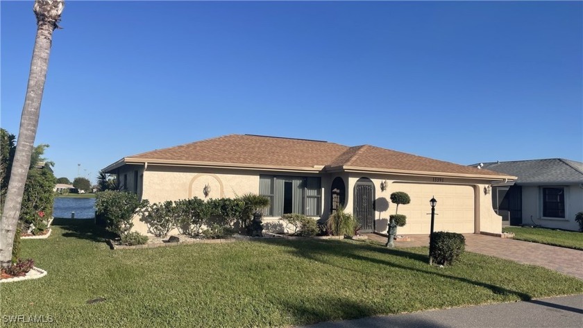 Very Quaint three Bedroom two Bath two Car Garage with Large - Beach Home for sale in Fort Myers, Florida on Beachhouse.com