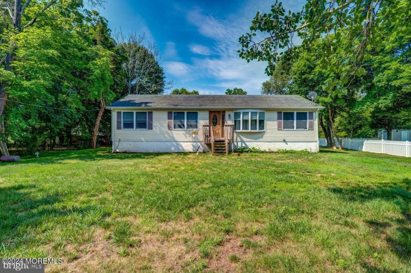 Welcome to this charming three-bedroom, two-bath ranch home - Beach Home for sale in Little Egg Harbor, New Jersey on Beachhouse.com