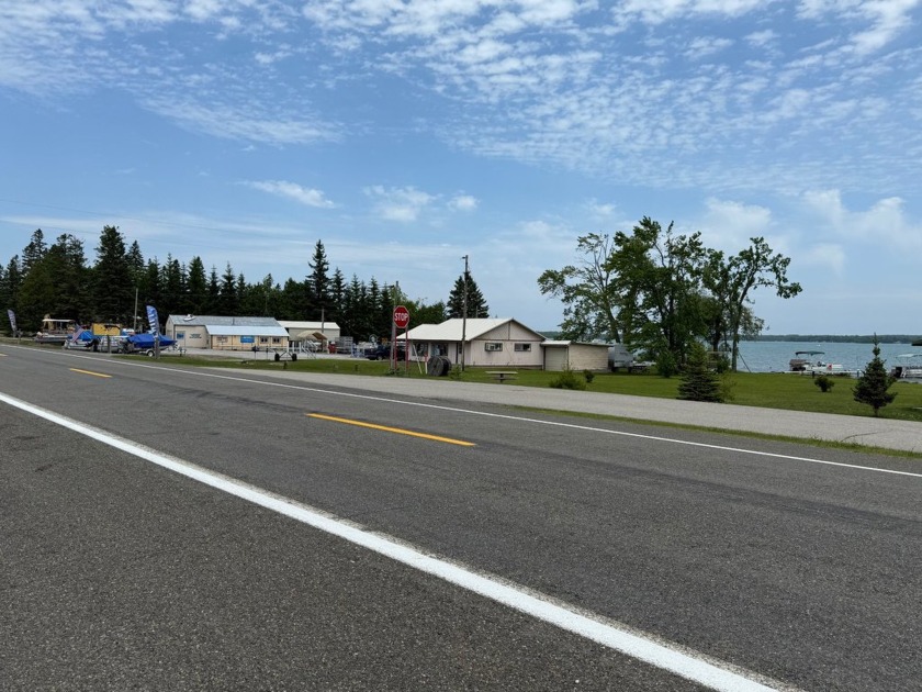 This rare waterfront property on Grand Lake in Presque Isle - Beach Home for sale in Presque Isle, Michigan on Beachhouse.com