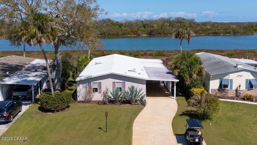 Rare riverside opportunity in Edgewater Landing! This oversized - Beach Home for sale in Edgewater, Florida on Beachhouse.com