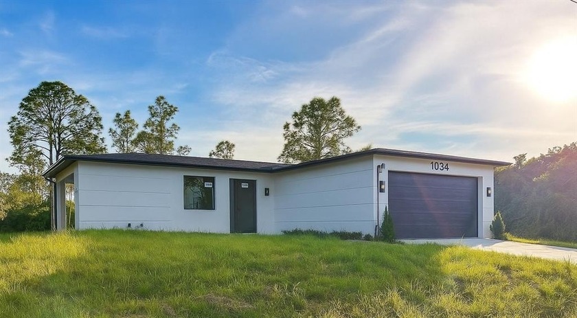 Brand-new modern home filled with natural light, featuring 3 - Beach Home for sale in Lehigh Acres, Florida on Beachhouse.com