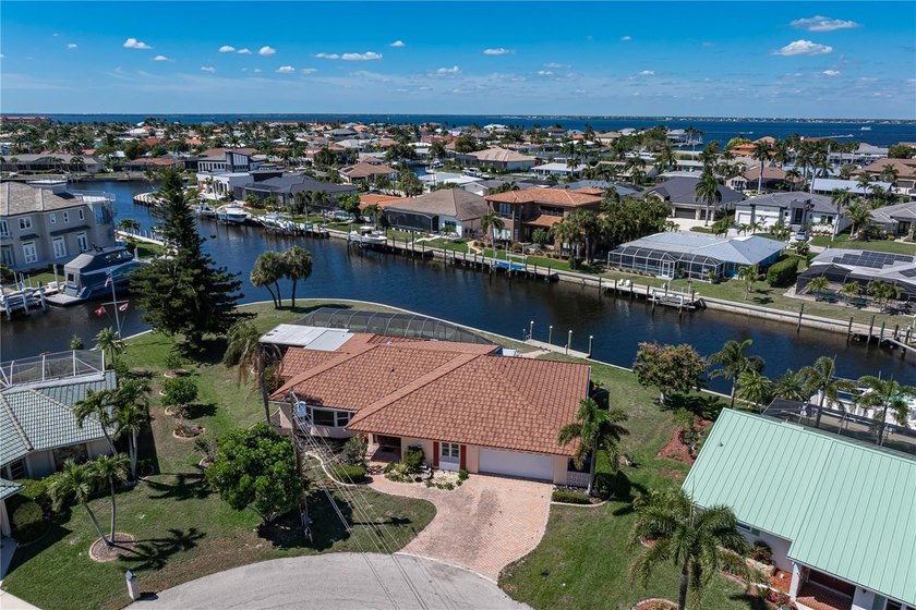WATERFRONT HOME W/NEW ROOF ON OVERSIZED TIP LOT & EXTREMELY - Beach Home for sale in Punta Gorda, Florida on Beachhouse.com