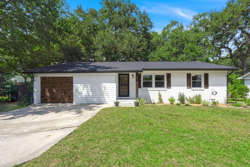 This beautifully renovated brick ranch home is nestled on a - Beach Home for sale in James Island, South Carolina on Beachhouse.com