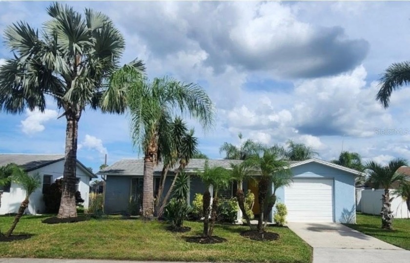 Price Improvement! Discover peaceful living in this charming - Beach Home for sale in Holiday, Florida on Beachhouse.com