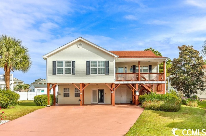Welcome to 916 Pebble Ln, a stunning 4-bedroom, 3-bathroom - Beach Home for sale in Murrells Inlet, South Carolina on Beachhouse.com