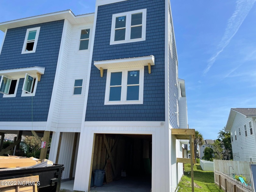 One of the island's most accomplished builders, Center City - Beach Townhome/Townhouse for sale in Carolina Beach, North Carolina on Beachhouse.com